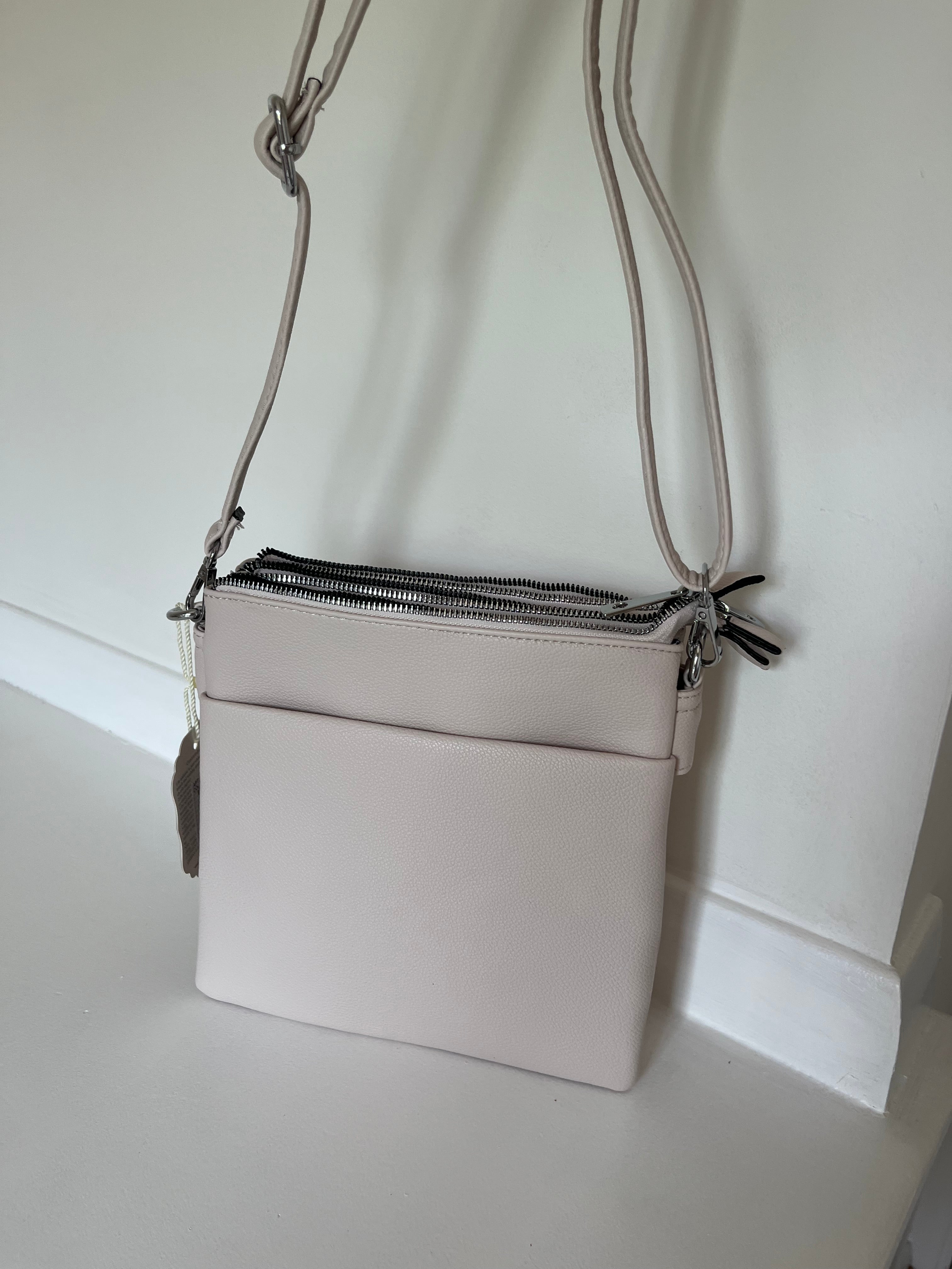 Cream cross body bag