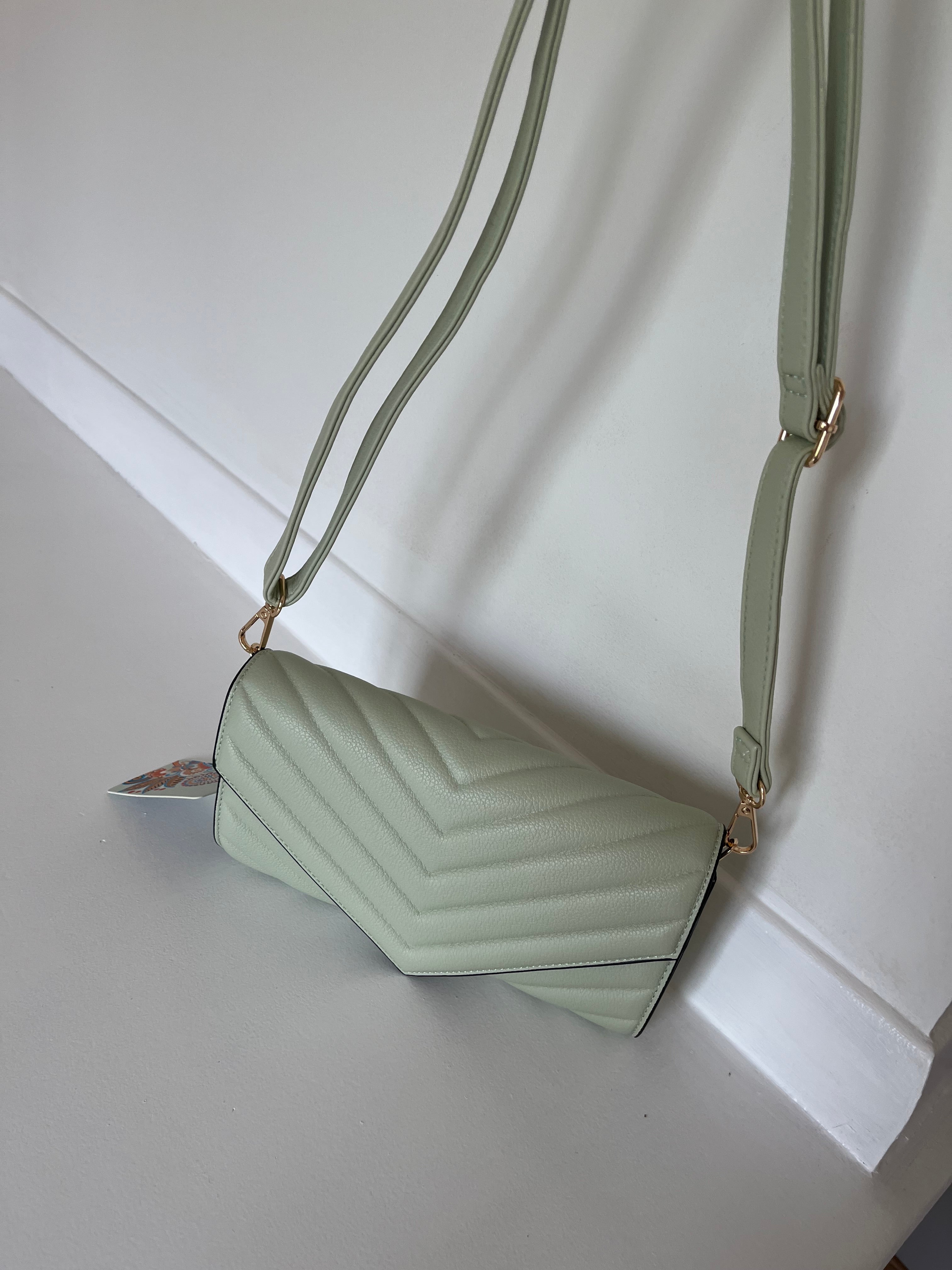 Mint green clutch