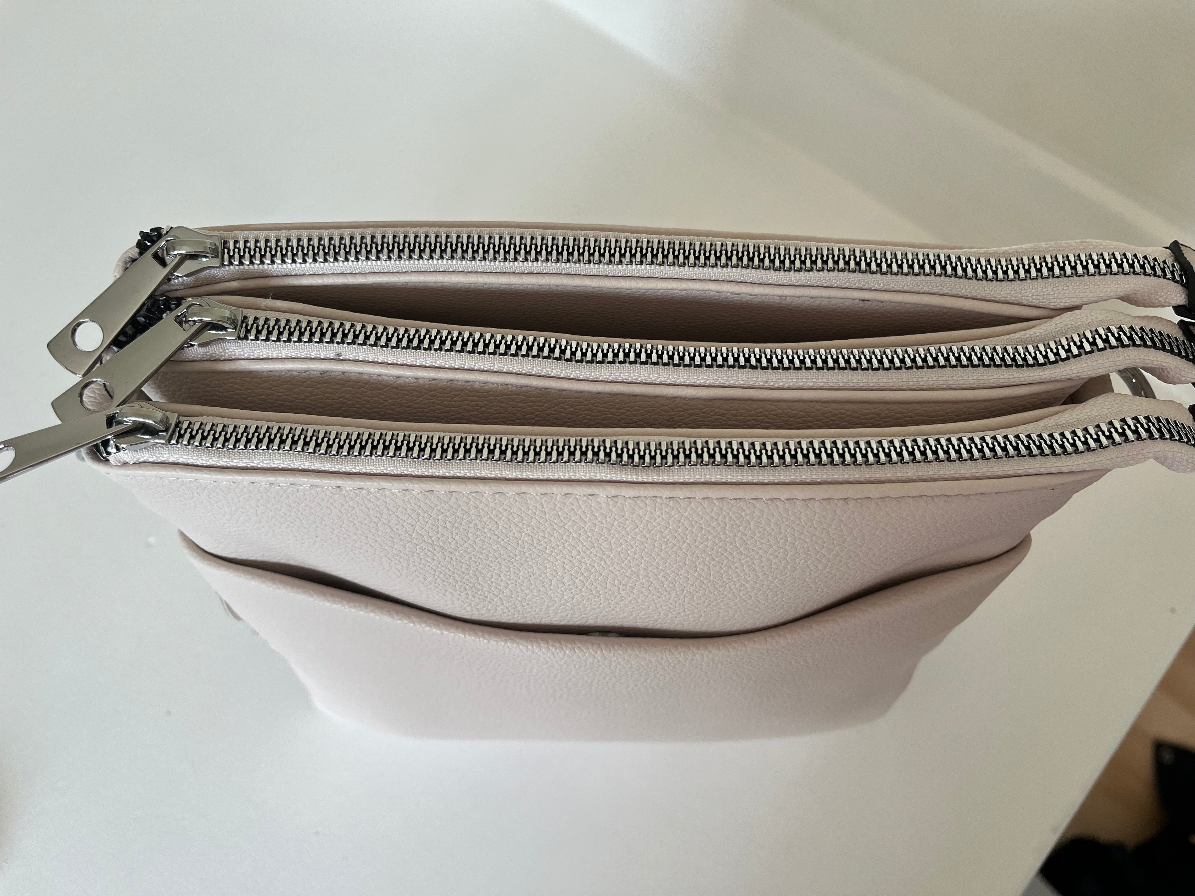Cream cross body bag