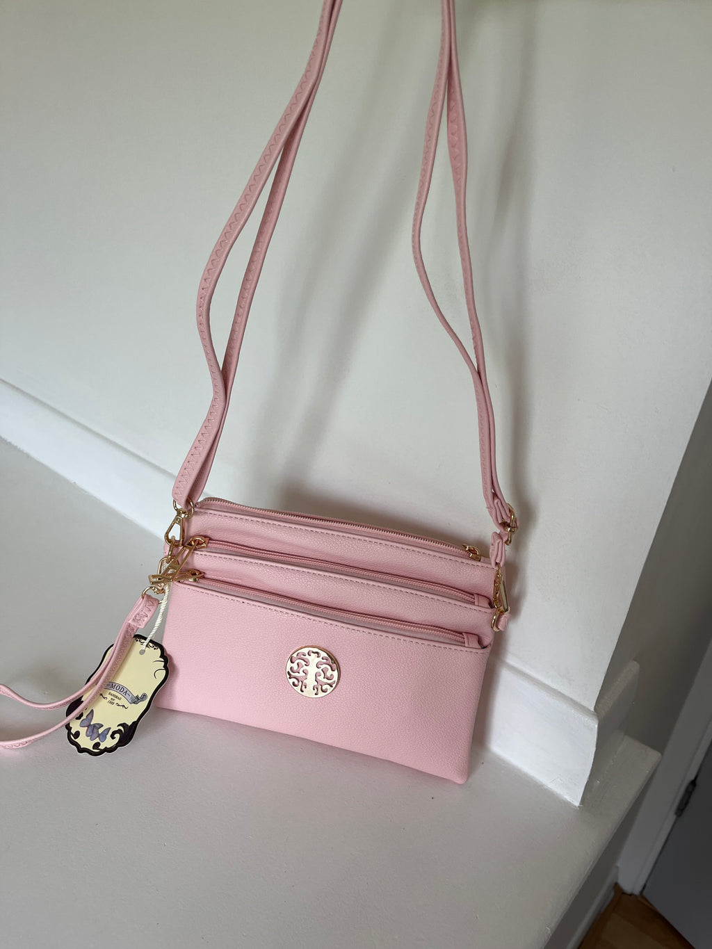 Pink cross body