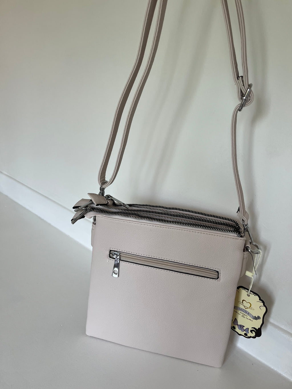 Cream cross body bag