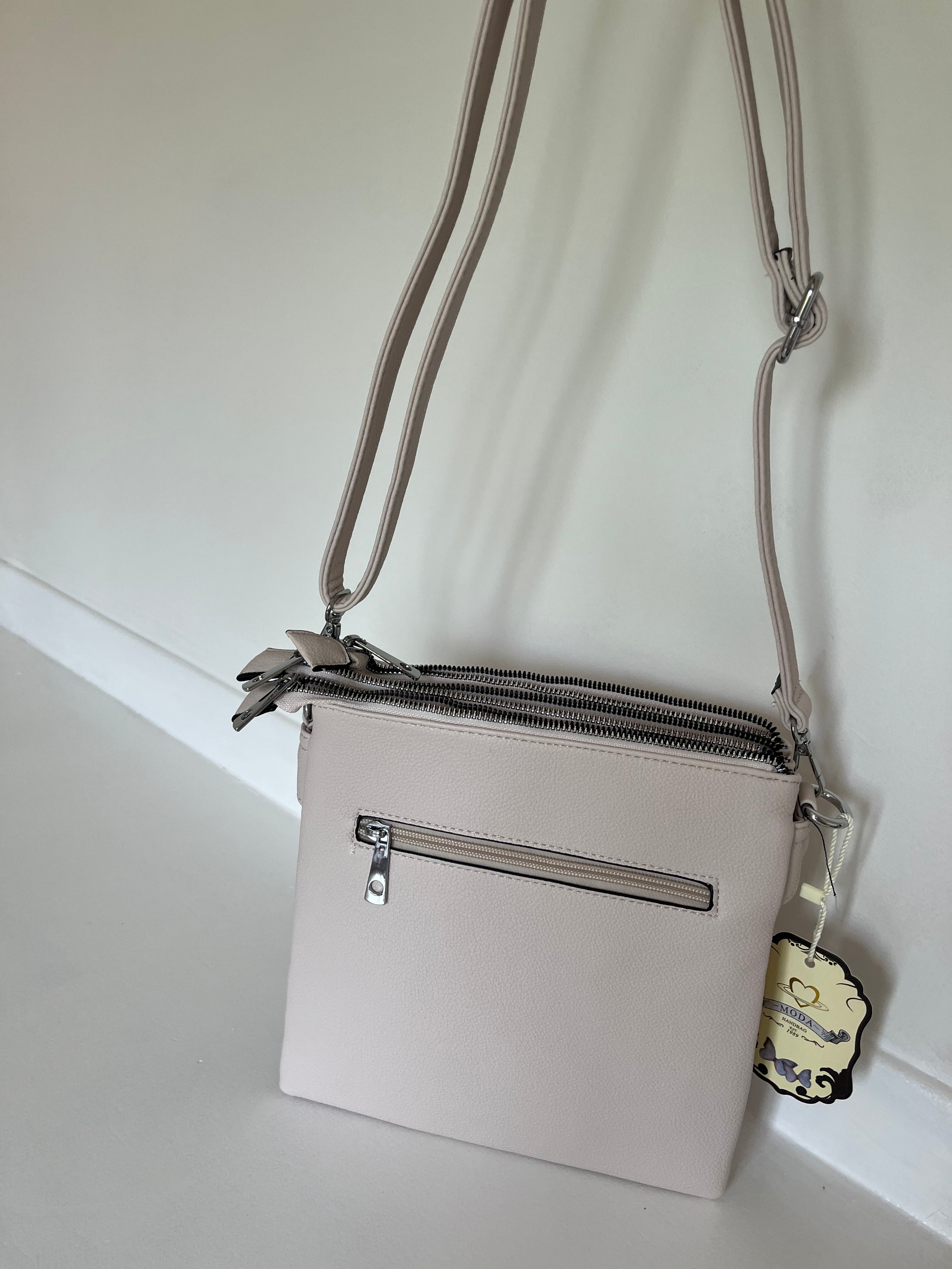Cream cross body bag